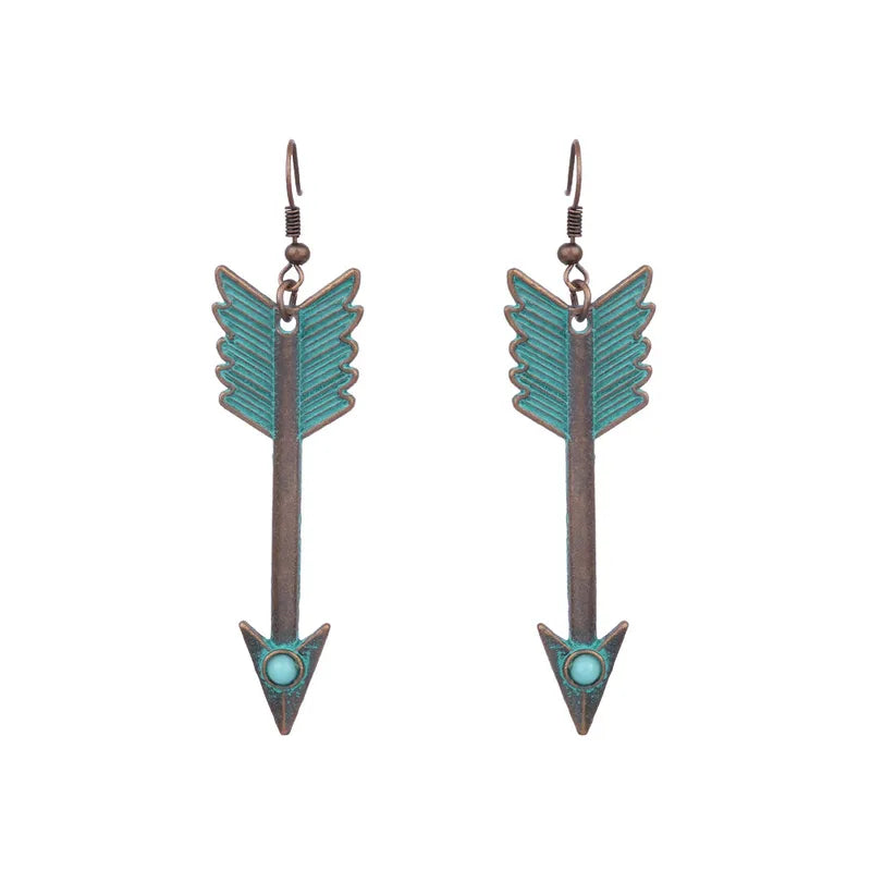 A pair of bronze green antique finish drop earrings featuring a downward arrow design with turquoise bead inlay.