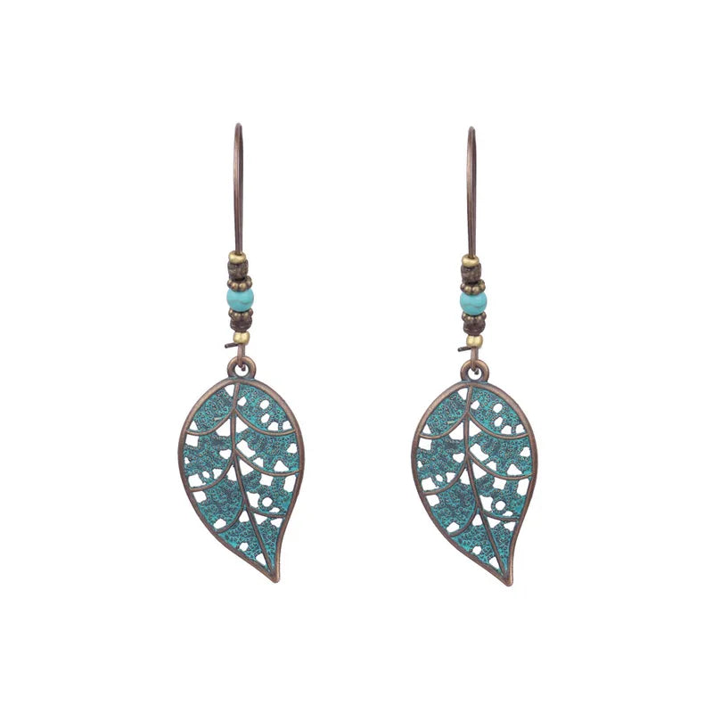 A pair of bronze green antique finish drop earrings with a Moroccan filigree leaf design.