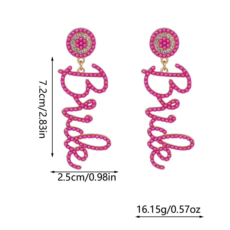 A pair of drop earrings designed with the word 'BRIDE' in script letters, made of seed beads and rhinestones, displayed with measurements