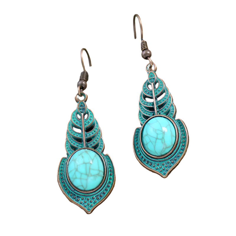 A pair of Moroccan Bohemian style antique bronze and green finish abstract feather teardrop dangle earrings.