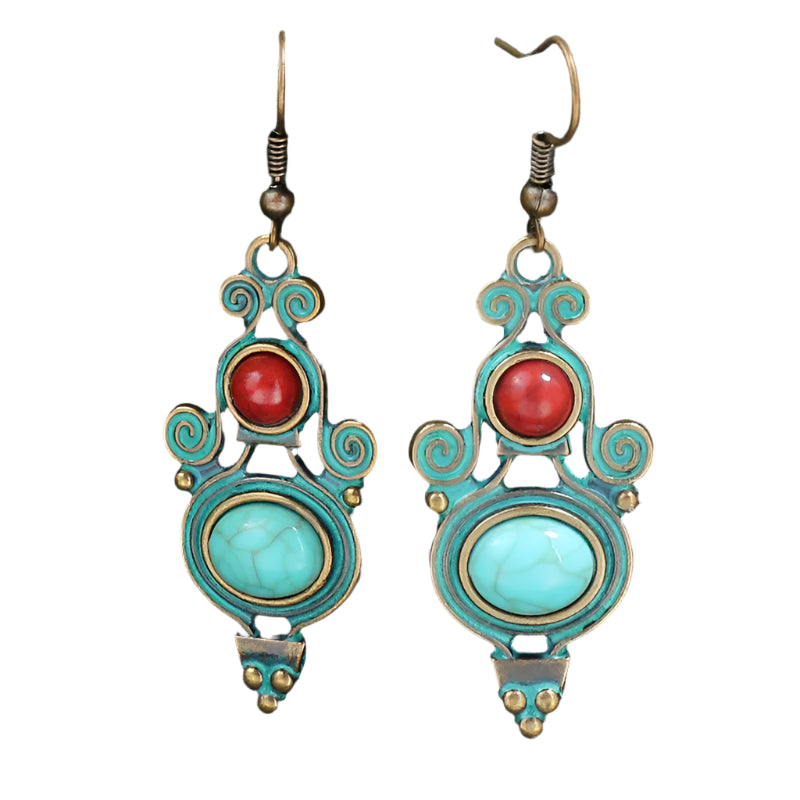 A pair of Moroccan Bohemian style dangle earrings with antique bronze finish and green and red stone accents.