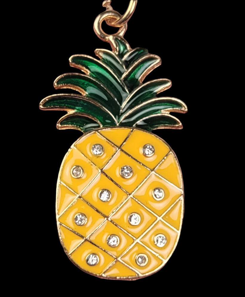 Pineapple-shaped keychain with rhinestones closeup