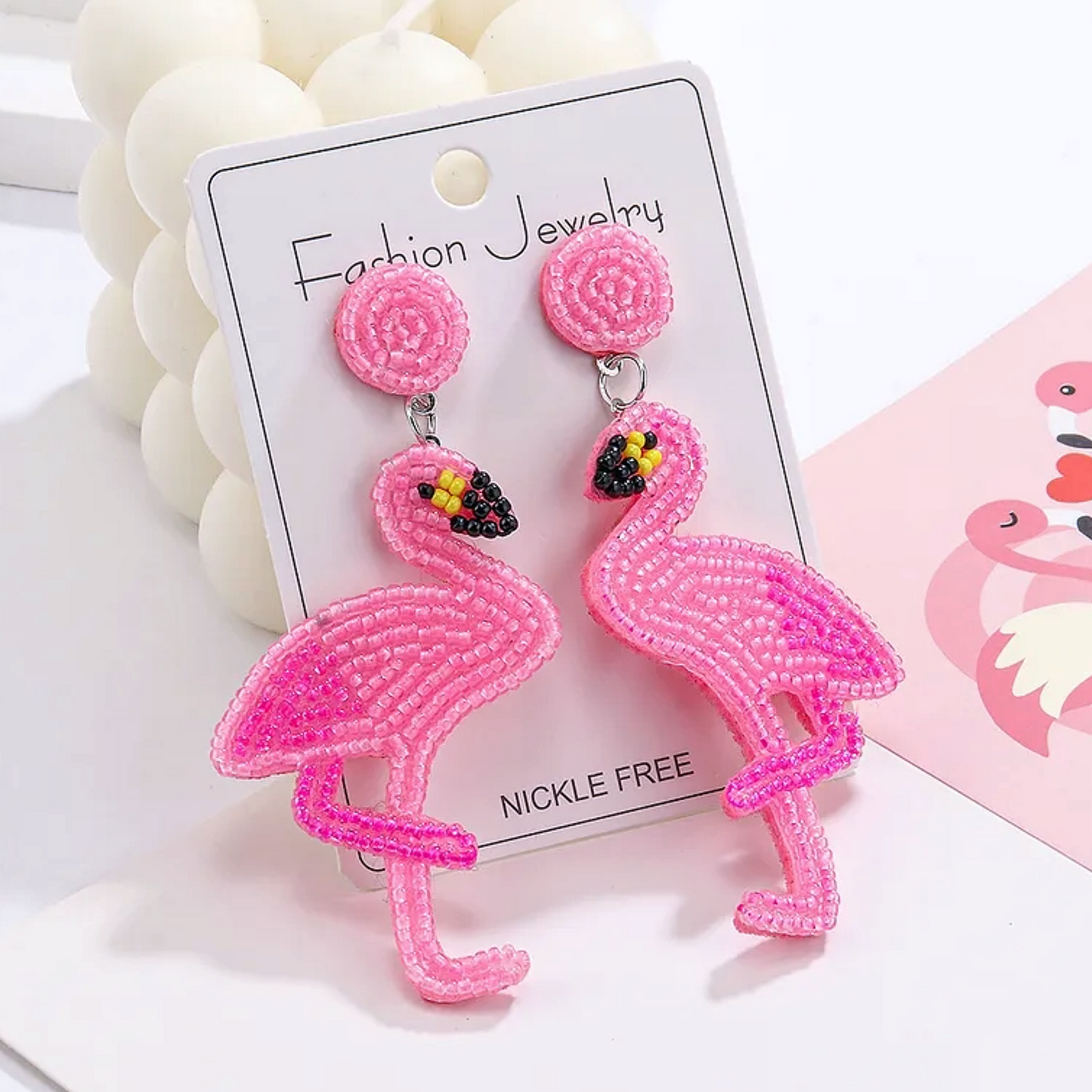 Pink Flamingo Beaded Earrings on White background