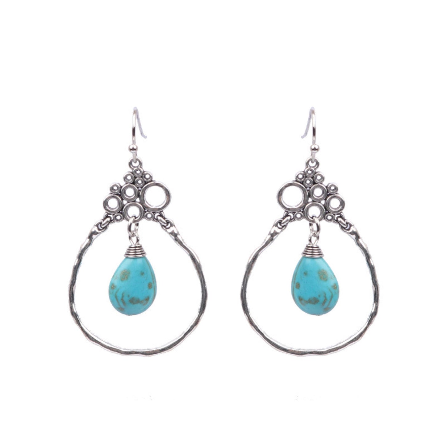 A pair of dangle earrings with a hammered silver metal finish and abstract turquoise bubble design.