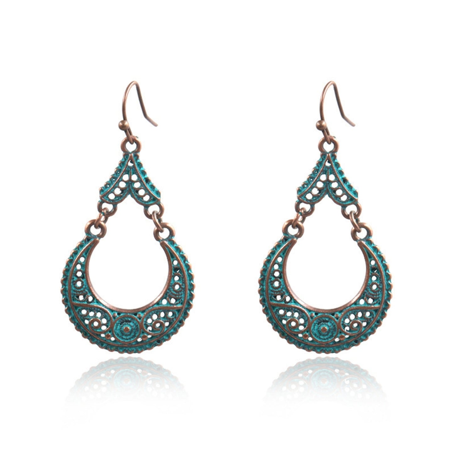 A pair of vintage bohemian inspired cutout dangle earrings with antique green and gold finish.