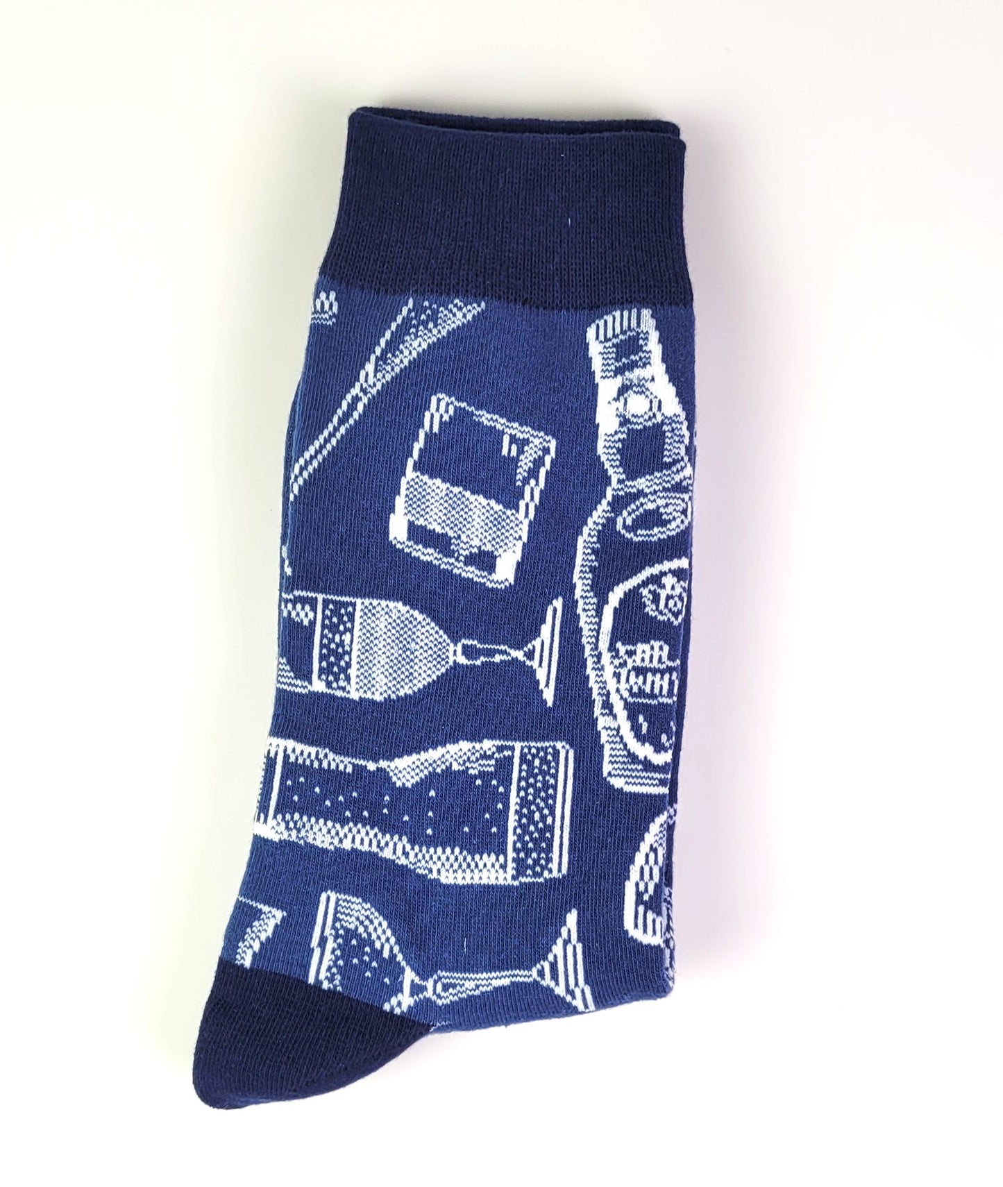 Navy sock with white drink-themed patterns on a white background
