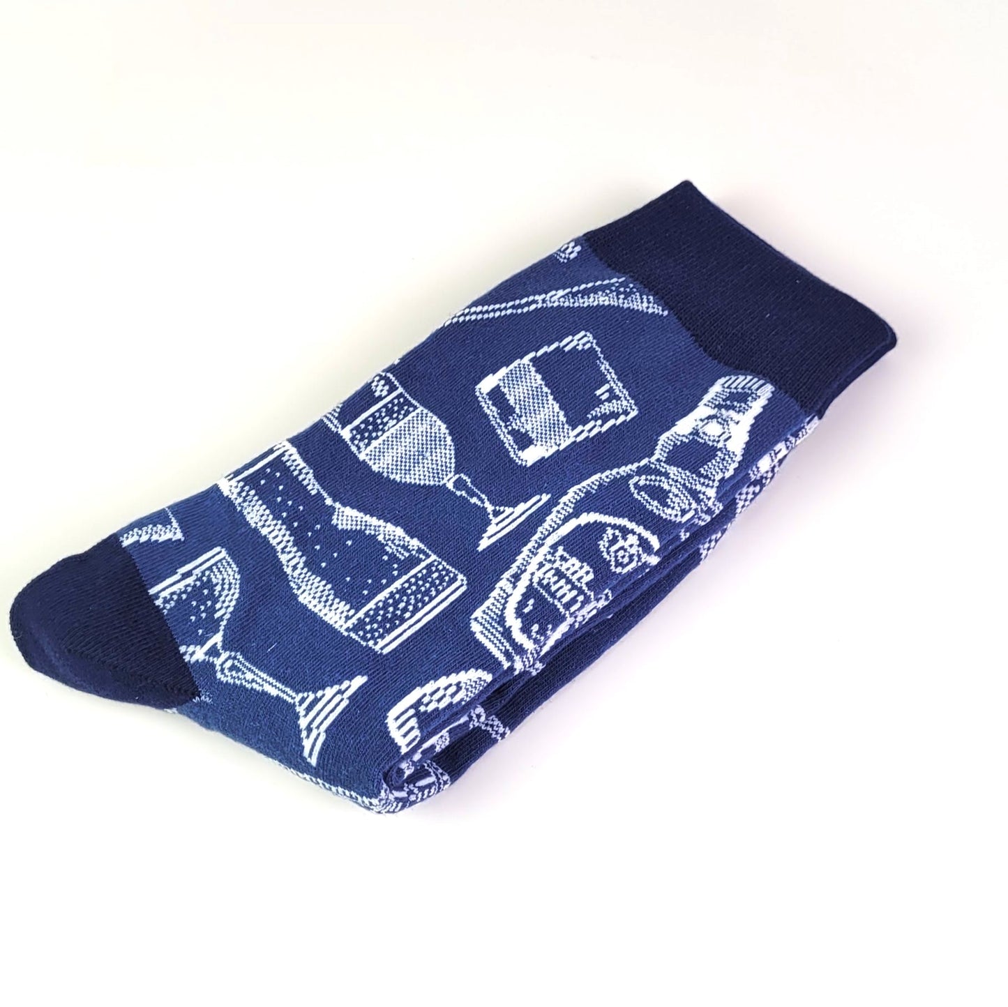 Blue sock with white wine glass pattern on a white background