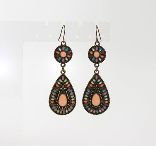 Pair of Western Boho style decorative earrings with multicolor enamel  on a white background