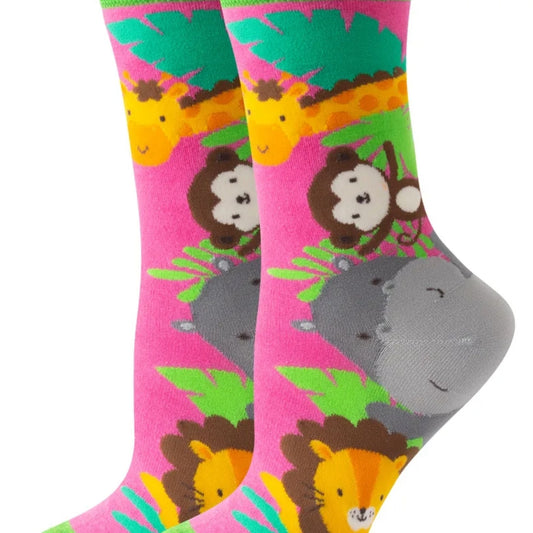 Colorful socks with animal patterns on a pink background