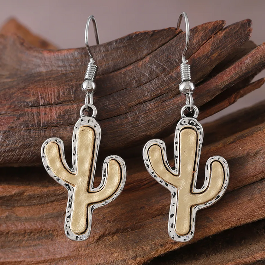 Cactus-shaped earrings on a white background