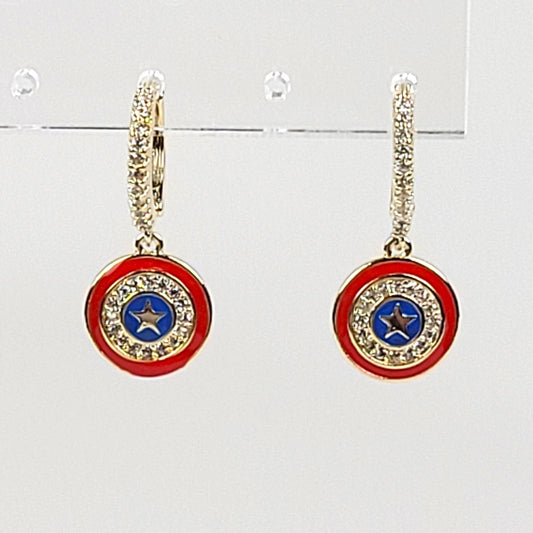 Pair of earrings with red, blue, and gold design on a white background