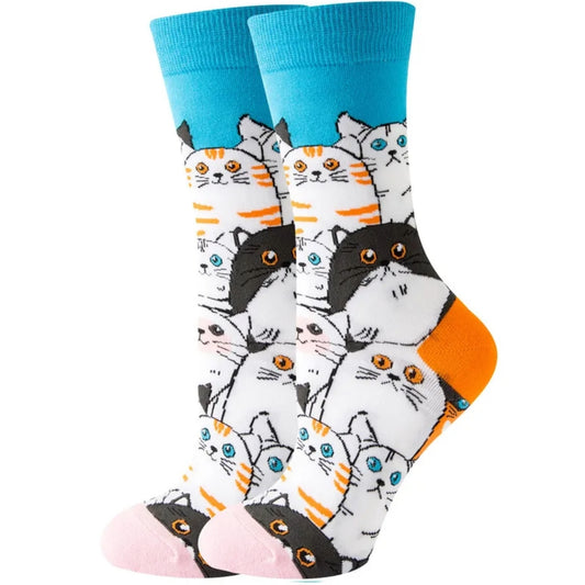 Pair of socks with cat pattern and blue cuff on a white background