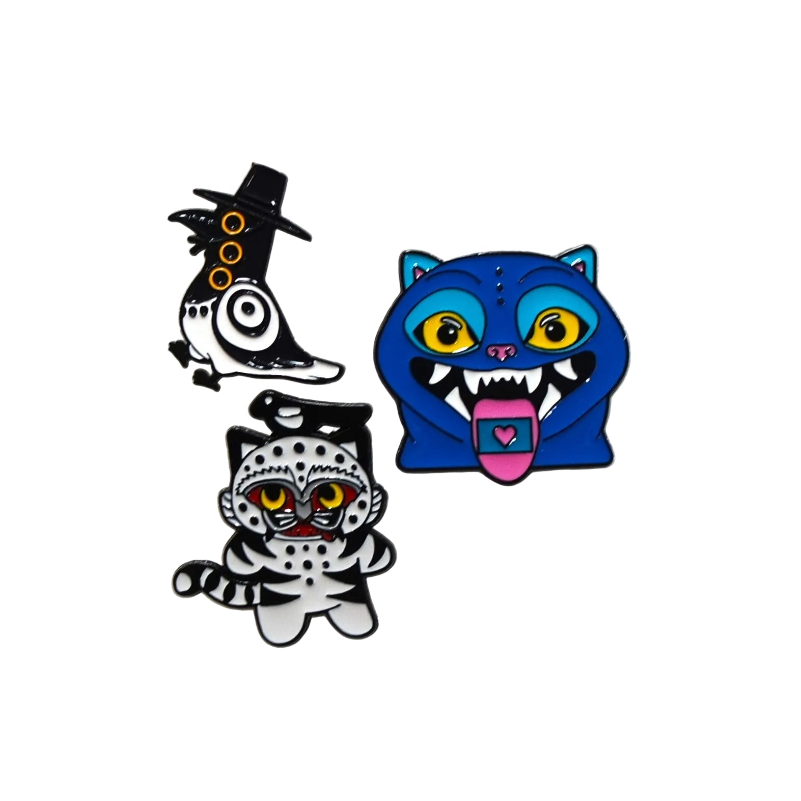 Three colorful cat-shaped pins on a textured white background
