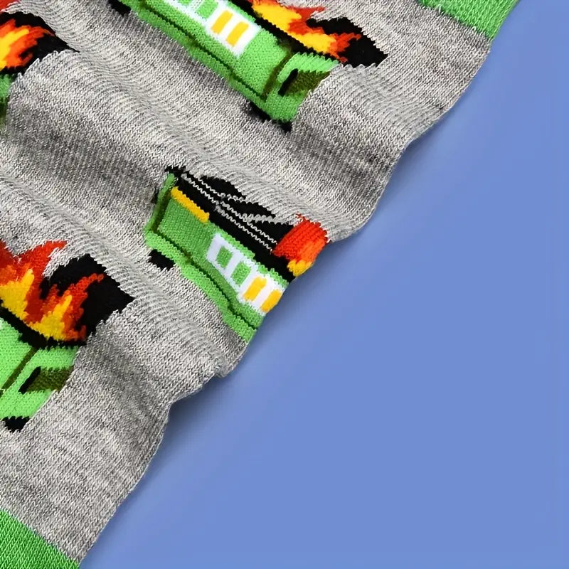 Gray socks with green dumpster and red designs on a blue background