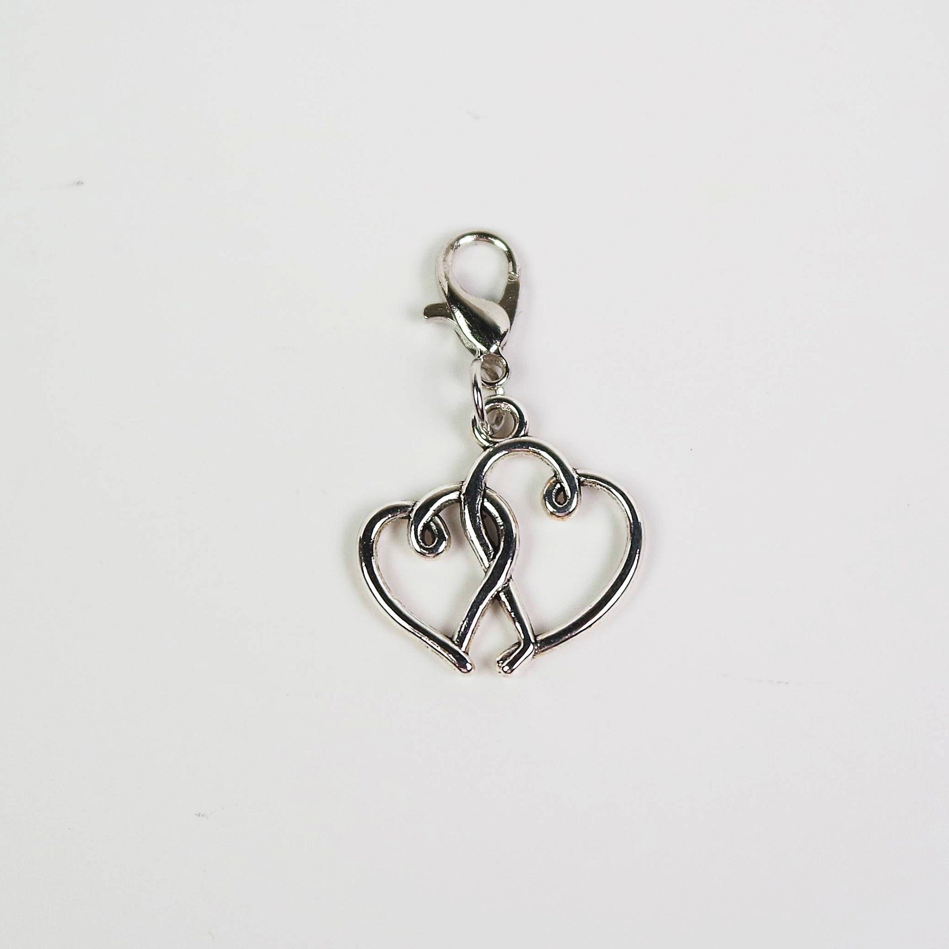 Silver heart charm on lobster clasp