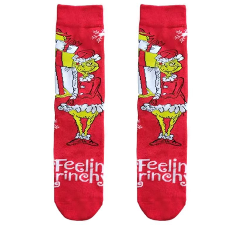 Red socks with a cartoon character and 'Feelin' Grinchy' text on a white background