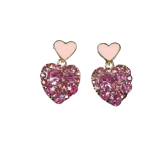 Heart-shaped earrings with pink gemstones on a black background