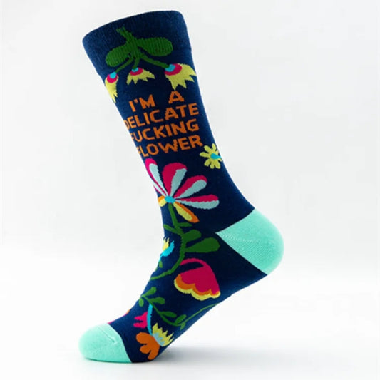 Colorful sock with floral design and text on a white background