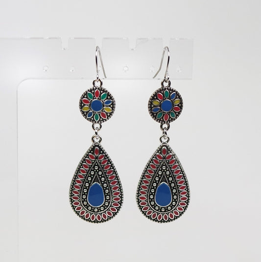 Pair of earrings with colorful designs on a white background