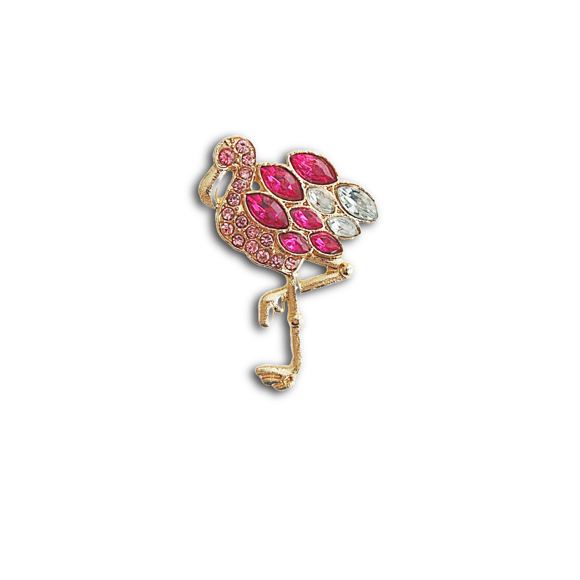 Flamingo-shaped brooch with pink and white gemstones on a white background