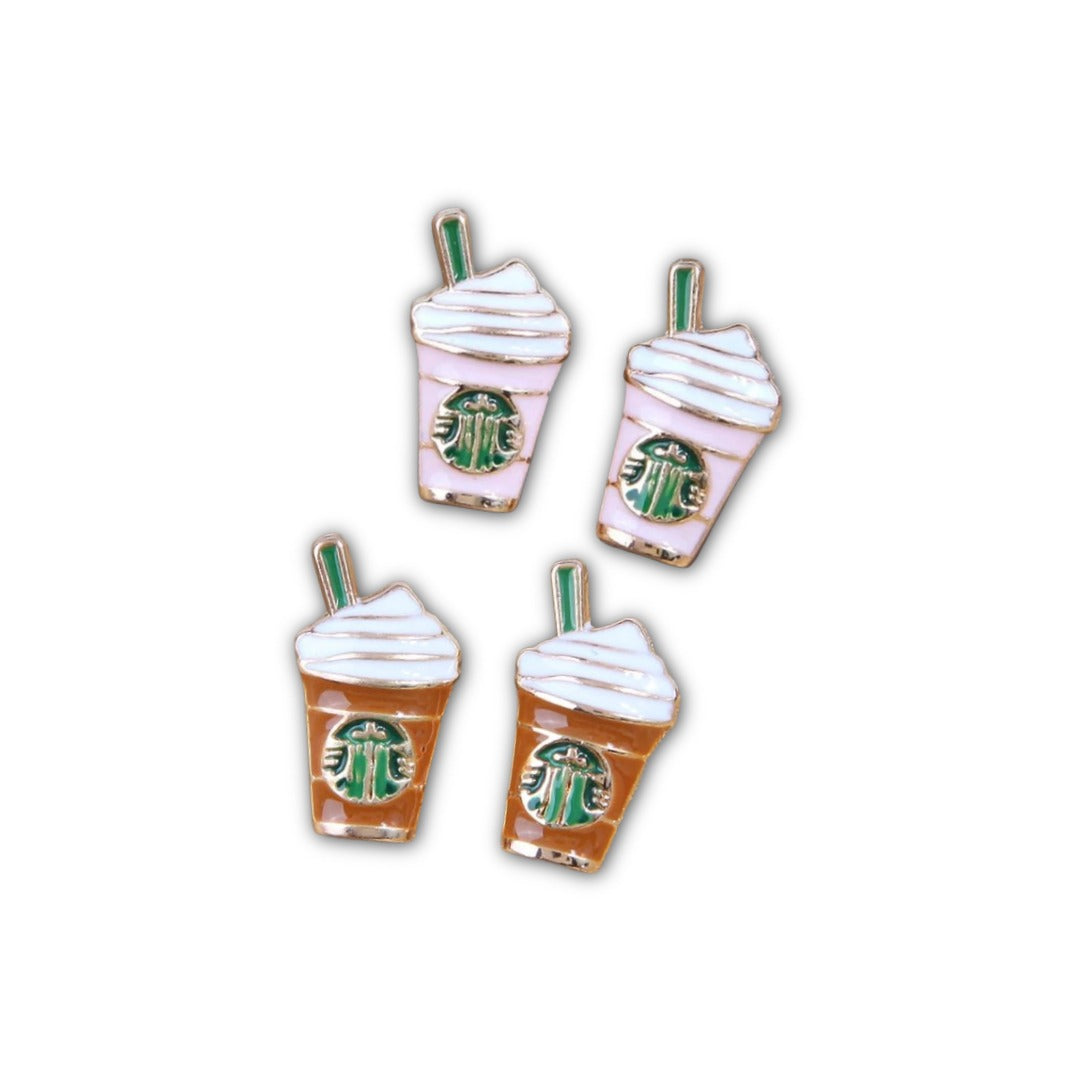 Four Starbucks drink pins on a white background