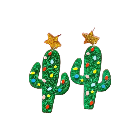 Glittery cactus-shaped earrings with star accents on a white background