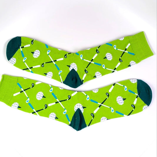Green socks with golf-themed pattern on a white background