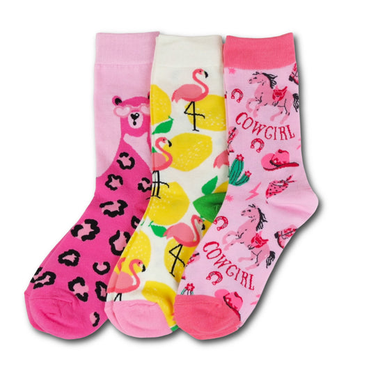 Three pairs of colorful socks with different designs on a white background